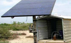 burts-ranch-case-study Daytime view of an off-grid solar power system attached to a water pump