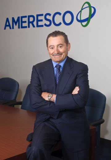 Portrait of Ameresco founder George Sakellaris in the Ameresco boardroom