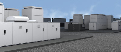 Several enclosed battery storage systems on the roof of a building