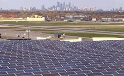 View of Minneapolis from solar panel farm at Minneapolis-St. Paul International Airport