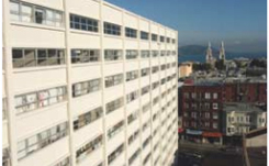san-francisco-housing-authority-case-study Daytime view of a residential high rise owned by the San Francisco Housing Authority