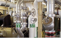 visn-6-case-study Interior view of VISN-6 central plant showing piping and valves