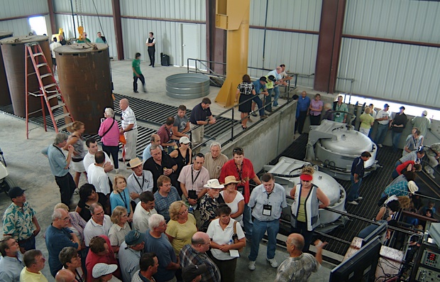 A press event is held inside a biomass plant