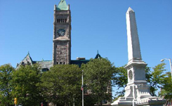 city-of-lowell-case-study-thumb Daytime view of the Lowell, Massachusetts city hall spire with a war memorial in the foreground