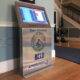 View of an interactive solar energy kiosk in the lobby of Braintree Town Hall