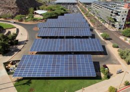 Panoramic aerial view of Arizona State University showing solar canopies over parking lots and on the roof of a parking garage