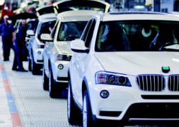 White BMW SUVs roll off an assembly line