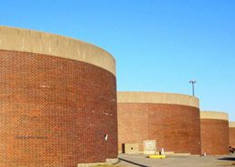 Daytime exterior view of brick tank enclosures at the Philadelphia Water Department