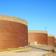 Daytime exterior view of brick tank enclosures at the Philadelphia Water Department