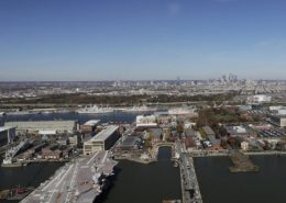 Daytime aerial view of Philadelphia Navy Yard with docks in the foreground
