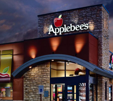 Night time exterior view of an Applebee's restaurant