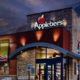 Night time exterior view of an Applebee's restaurant