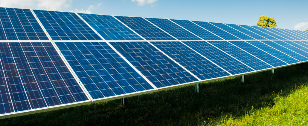 Solar power panels on blue sky and copy space