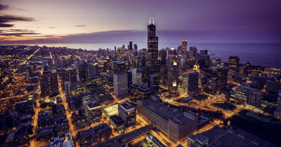 Sunset aerial view of Chicago looking toward Lake Michigan