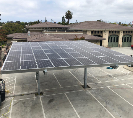 Daytime view of a solar car port in National City, built by Ameresco.