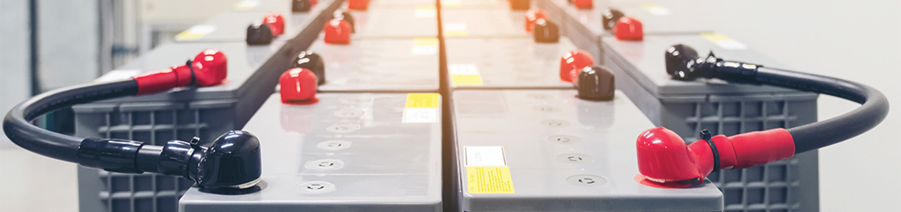 Close up interior view of large-capacity batteries arrayed in an energy storage system