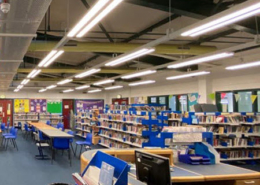 Interior view of a library with LED overhead lights in West Lothian