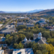 Daytime aerial view of Carson City with mountains in the distance