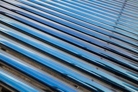 Daytime close up view of solar thermal heating tubes