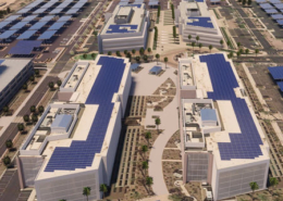 A daytime aerial view of a corporate campus in Chandler with renderings of rooftop solar panels and solar canopies added