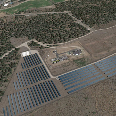 holy-cross-energy-colorado-moutain-college-featured-image Daytime aerial view of land near Rocky Mountain College with rendered solar panels