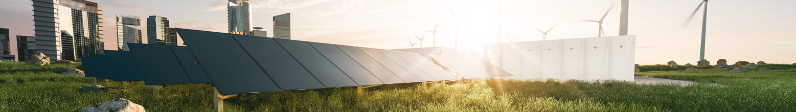 Daylight view of sunlight reflecting off solar panels with a portion of a city skyline in the background