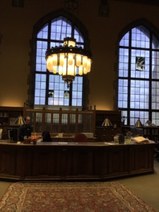 Daytime interior view of a main desk at Deering Library at Northwestern University