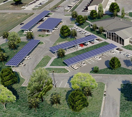 Daytime aerial view of a main building at Joint Base San Antonio showing renderings of rooftop and carport solar panels