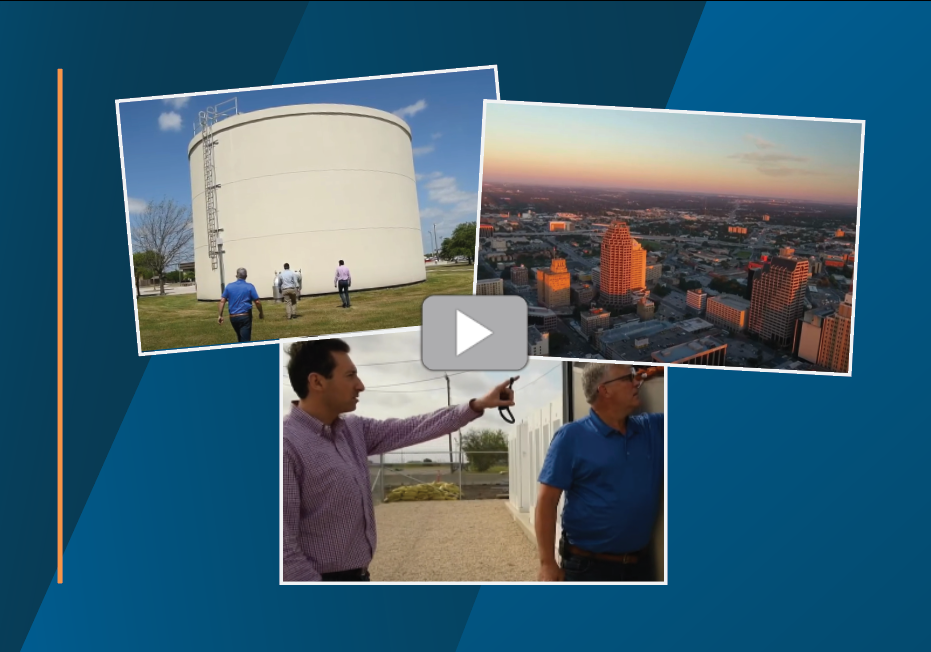 Preview image for virutal microgrid tour shows an aerial view of a cityscape at sunset, people walking toward a large outdoor fuel tank and two people examining a battery enclosure
