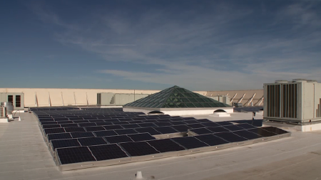 Daytime view of rooftop solar panels in Englewood, Colorado