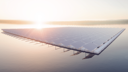 Sunrise view of a solar array floating on a pond at Fort Bragg