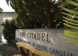 Daytime close up view of a sign at the entrance of The Citadel