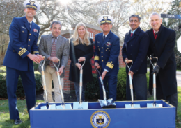 Daytime exterior view of officials at a groundbreaking at the U.S. Coast Guard Academy in New London, Connecticut