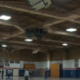 Interior view of a gymnasium at Revere Public Schools showing LED light fixtures