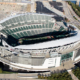 Daytime aerial view of Paul Brown Stadium between Interstate 71 and the Ohio River