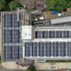 Overhead aerial view of solar panels on the roof of University of West London