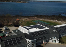 Aerial view of solar panels on the roof of the Seacoast Science Center in New Hampshire