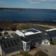 Aerial view of solar panels on the roof of the Seacoast Science Center in New Hampshire
