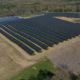Daytime aerial view of a solar farm at GSK Consumer Healthcare in Oak Hill, New York