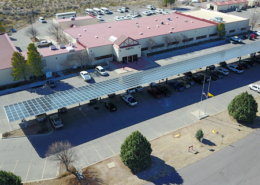 Daytime aerial view of a solar carport at New Mexico Institute of Mining and Technology