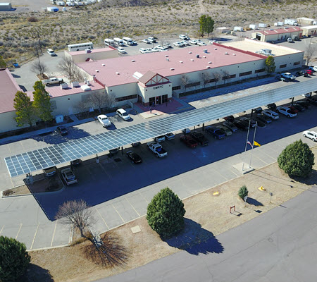 Daytime aerial view of a solar carport at New Mexico Institute of Mining and Technology
