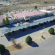 Daytime aerial view of a solar carport at New Mexico Institute of Mining and Technology