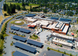 Daytime aerial view of Santa Rosa Hospital showing solar carports