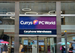 Daytime exterior view of Currys Electronics on Oxford Street in London
