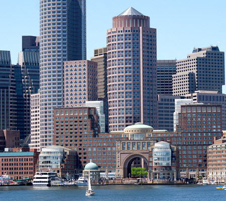 Daytime view of the Boston waterfront skyline as seen from Boston Harbor
