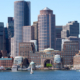 Daytime view of the Boston waterfront skyline as seen from Boston Harbor