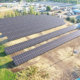 Daytime aerial view of a solar array at the City of Missoula wastewater treatment plant