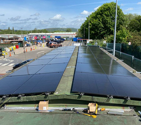 Daytime view of a rooftop solar system in Swansea United Kingdom