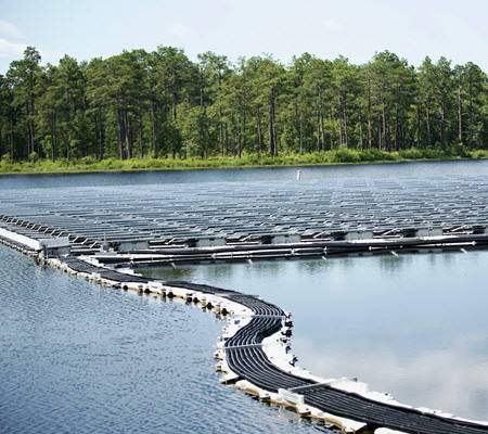Daytime view of a floating solar panel array at Fort Liberty in North Carolina