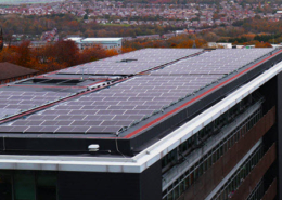 Daytime view of a rooftop solar array on a Barnsley Council building